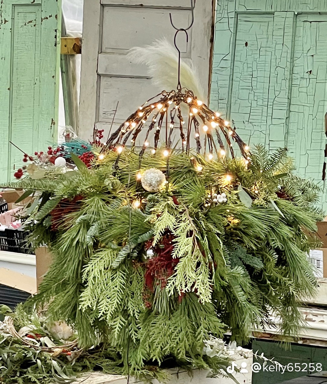 lighted holiday sphere filled with fresh pine