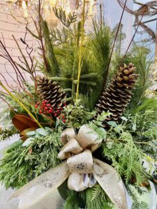 Spruce tip holiday pot created at Kelly's Cottage Garden