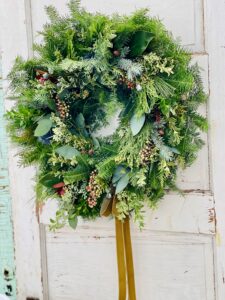 Fresh evergreen holiday wreath created at Kelly's Cottage Garden